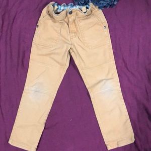 Khaki colored cargo style pant.